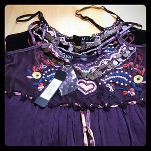 Two new embroidered camisoles